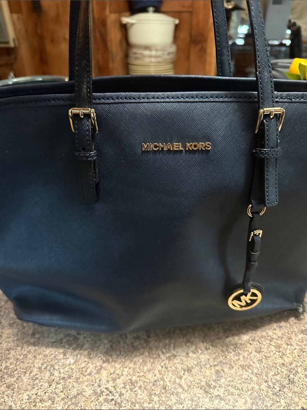 Michael Kors Navy Leather Saffiano Tote with Gold Hardware SM tear on bottom